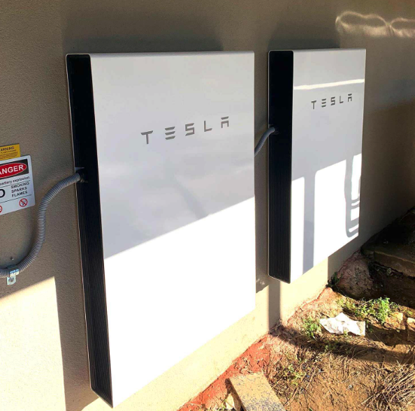 Tesla Powerwall 2 Why the number panels needed varies The output of a single panel will vary between 250W and 455W. To make up 10,000 Watts you will need 40 x 250W panels or 22 x 455W panels. Amount of sunlight; areas with little sunlight or shorter daytime require more solar panels spread over a large area to catch the most sunlight possible. Rooftop space; limited rooftops can be a problem when installing solar systems, especially in suburban. Houses with small rooftops are advised to go for high-wattage solar panels as they take up less space but provide substantial energy. How do I calculate how many solar panels I need for a 10kw solar system? To calculate the number of solar panels you will need for a 10kw solar system, use the following steps; Firstly, find out how much wattage of energy is required. You can request a paper bill from your power company and it will show how much energy is consumed monthly. Getting an idea of the annual energy usage is best because energy needs can vary from month to month. Secondly, find out how much sunlight the area of residence receives every month. The more sunlight the area receives, the more energy is produced. Find out the dimensions of your rooftop or the available space where the solar panels will be placed. Small space for solar panels means higher wattage solar panels will be the best option. For a 10kw solar system, if you use the average wattage solar panels which are approximately 370 watts. Then the number of solar panels needed will be; 10kw X 1000 = 10,000w 10,000w / 370 watt = 27 solar panels This means that for a 10kw solar system using 370-watt solar panels, 27 solar panels will be required to fully charge the solar system. If your space cannot fit 27 solar panels, consider high-wattage solar panels. How many batteries are needed for a 10kW solar system? If you are looking to be fully self sufficient and dont want to rely on the feed-in tariffs, solar batteries are a great idea to store power for later use. A 10kw solar system produces an average of 40 kilowatt hours every day. On average about 15kW will be used by the home during the day and the rest (28kW) will be used at night. Two Tesla Powerwall batteries will get you most of the way with each rated at 13.5kW for a total of 27kW.