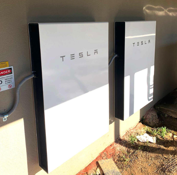 Why the number panels needed varies The output of a single panel will vary between 250W and 455W. To make up 10,000 Watts you will need 40 x 250W panels or 22 x 455W panels. Amount of sunlight; areas with little sunlight or shorter daytime require more solar panels spread over a large area to catch the most sunlight possible. Rooftop space; limited rooftops can be a problem when installing solar systems, especially in suburban. Houses with small rooftops are advised to go for high-wattage solar panels as they take up less space but provide substantial energy. How do I calculate how many solar panels I need for a 10kw solar system? To calculate the number of solar panels you will need for a 10kw solar system, use the following steps; Firstly, find out how much wattage of energy is required. You can request a paper bill from your power company and it will show how much energy is consumed monthly. Getting an idea of the annual energy usage is best because energy needs can vary from month to month. Secondly, find out how much sunlight the area of residence receives every month. The more sunlight the area receives, the more energy is produced. Find out the dimensions of your rooftop or the available space where the solar panels will be placed. Small space for solar panels means higher wattage solar panels will be the best option. For a 10kw solar system, if you use the average wattage solar panels which are approximately 370 watts. Then the number of solar panels needed will be; 10kw X 1000 = 10,000w 10,000w / 370 watt = 27 solar panels This means that for a 10kw solar system using 370-watt solar panels, 27 solar panels will be required to fully charge the solar system. If your space cannot fit 27 solar panels, consider high-wattage solar panels. How many batteries are needed for a 10kW solar system? If you are looking to be fully self sufficient and dont want to rely on the feed-in tariffs, solar batteries are a great idea to store power for later use. A 10kw solar system produces an average of 40 kilowatt hours every day. On average about 15kW will be used by the home during the day and the rest (28kW) will be used at night. Two Tesla Powerwall batteries will get you most of the way with each rated at 13.5kW for a total of 27kW.